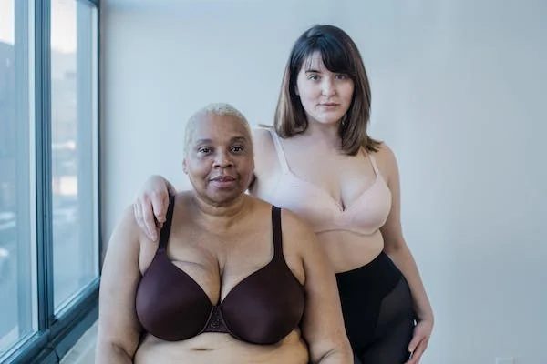 2 women model wearing push-up bras