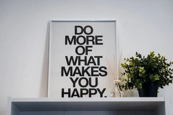 a frame quote of "do more of what makes you happy."