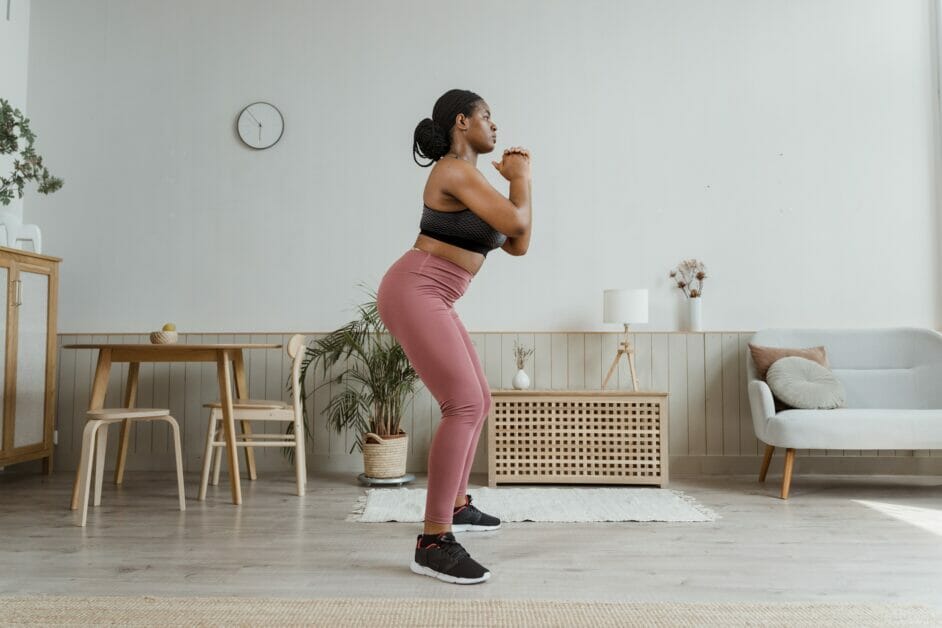 a woman doing a squat exercise