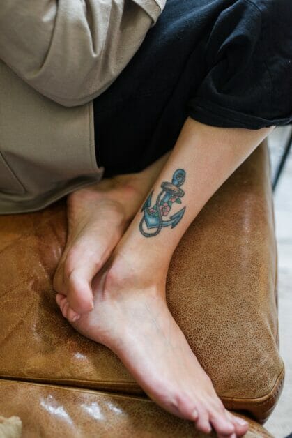 anchor tattoo on the woman's right foot