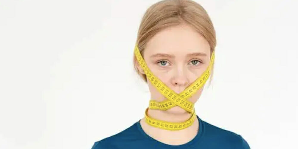 girl gag with tape measure