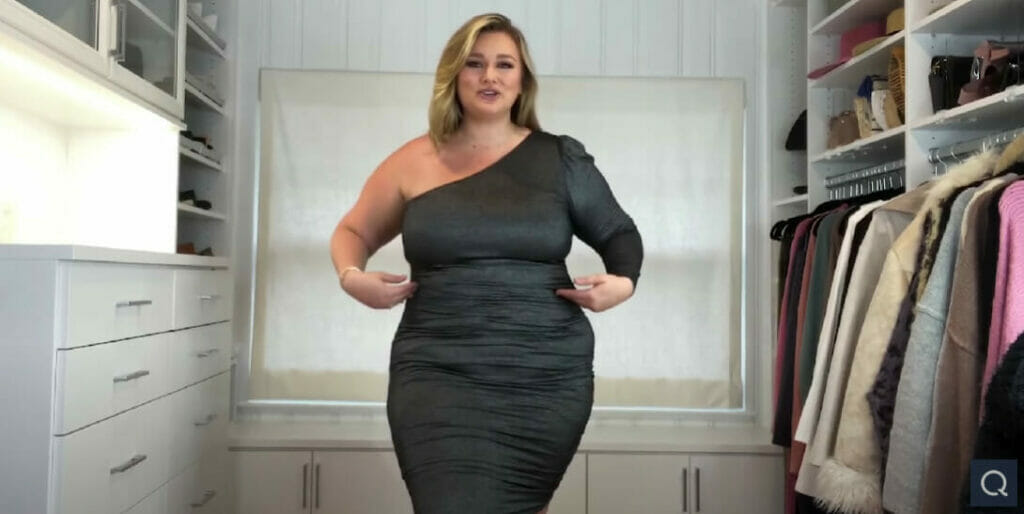 Hunter McGrady wearing a black cocktail fitted dress
