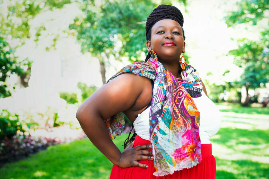 plus-size woman in a red lip and skirt summer fashion
