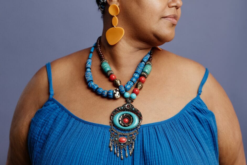 plus size woman wearing blue dress with blue accessories