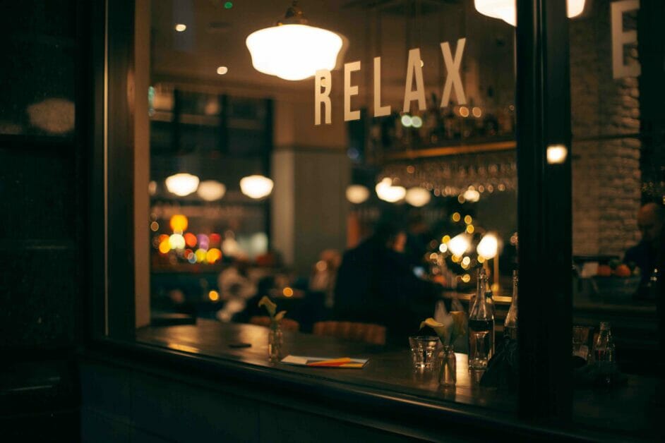 relax printed outside the window of a resto-bar