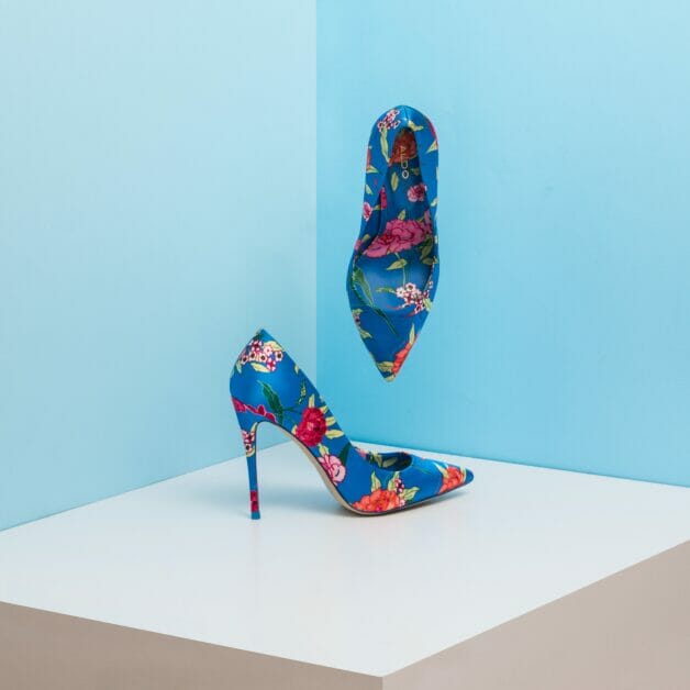 woman's stiletto in blue pink flower combination