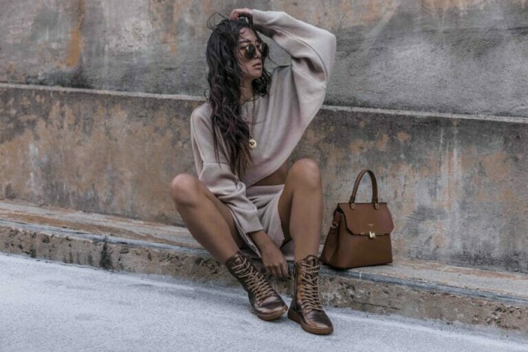 fashionista woman in brown shades accessories and dress