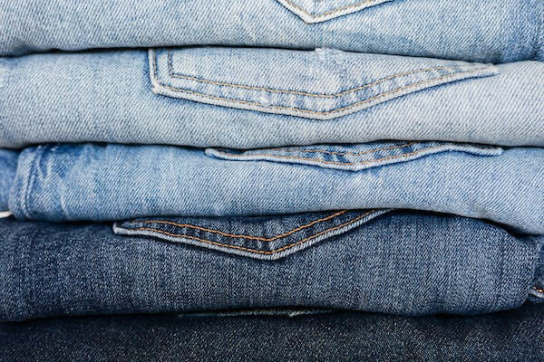 folded jeans from blue to faded color
