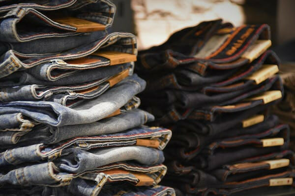 jeans fold and piled neatly according to color